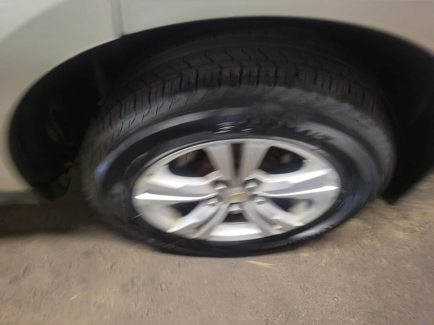 A Close Up Of A 2014 Chevrolet Equinox Tire.